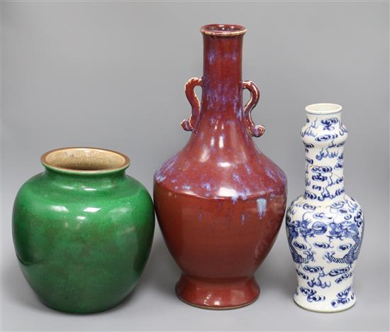 A Chinese flambe two handled vase, a green crackle-glazed jar and a blue and white vase tallest 40.5cm